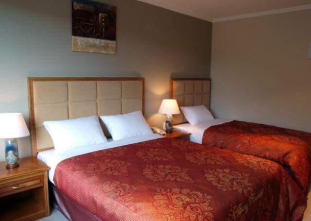 أوكلاند Albany Rosedale Motel الغرفة الصورة